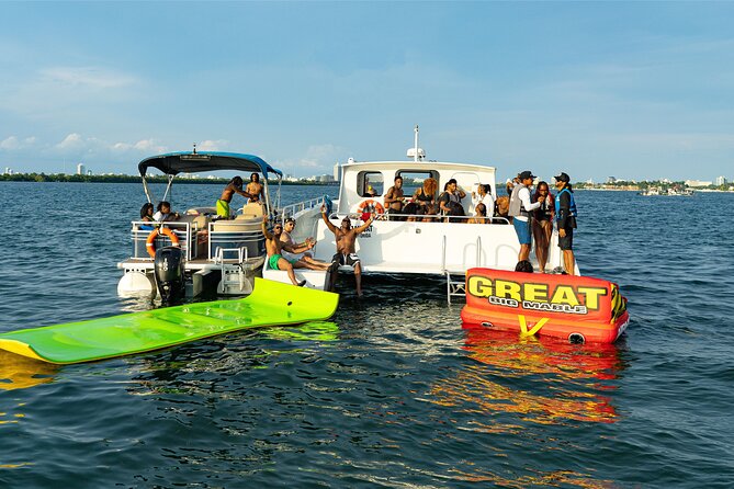 Aquatic Adventure: Boat Tour with Jetskis, Tubing, and Open Bar - Crossing Biscayne Bay by catamaran