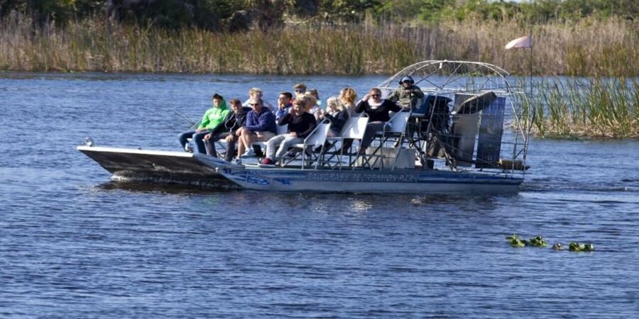 Fort Lauderdale: Everglades Express Tour with Airboat Ride - Leaving Fort Lauderdale in a seven-person van