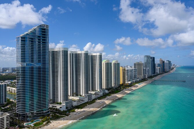 Helicopter Tour- Hard Rock Guitar, Miami & Gold Coast Tour - Crossing Haulover Beach and the bay