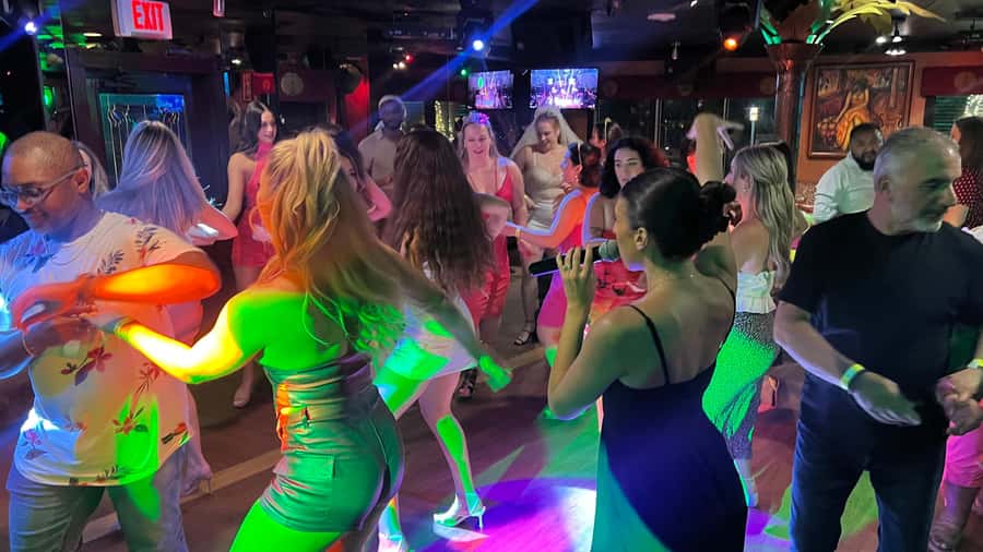 Mango's Miami: Salsa Lessons, Mojitos, Bites & Live Music - After 10pm: Mango’s nightclub, live bands, and tropical shows