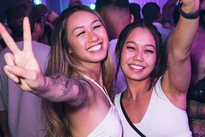 Miami: Adults Only Party Cruise with Two Drinks Included - A party boat with Miami as the backdrop