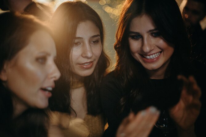 Miami: Adults Only Party Cruise with Two Drinks Included - Downtown Miami lit up after dark