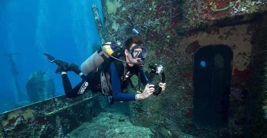 Miami Beach: Guided 2-Tank Reef and Wreck Dive Trip - The reef stop shifts attention to sea life