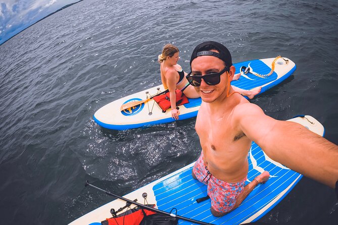 Miami Beach Paddleboard Rental with Instruction - Finding your balance on calm Miami water