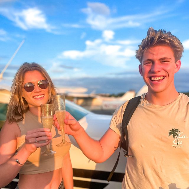 Miami Beach: Romantic Sunset Flight with Champagne - The first views: Fairchild and Vizcaya