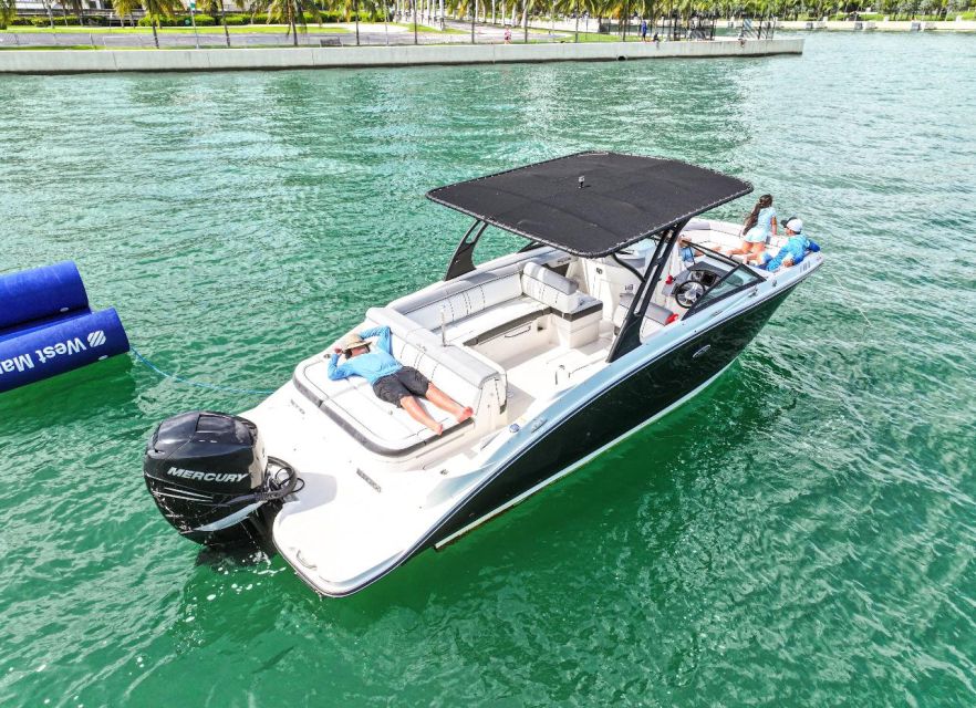 Miami: Guided Boat Tour with Champagne - Flagler Monument Island is the main swimming stop