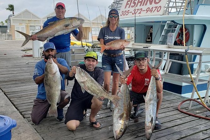 Miami Half Day Deep Sea Fishing Trip from Bayside Marketplace - Fishing from a crowded rail