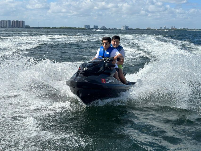 Miami: Miami Beach Jetski Ride with Boat and Drinks - Searching for dolphins and manatees