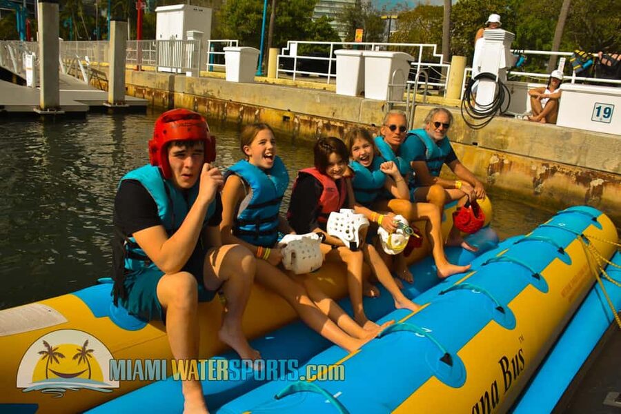 Miami: Tubing Ride Experience - Holding on while the boat builds speed