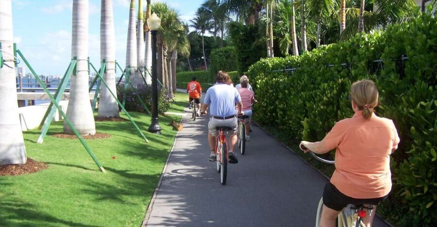 Palm Beach: Historical Bicycle Tour of Palm Beach Island - Following the Lake Trail past Seagull Cottage and the Kapok Tree