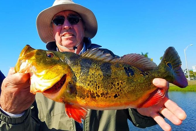 Peacock Bass Fishing Trip in Boynton Beach - Optional waterfront break with food and music