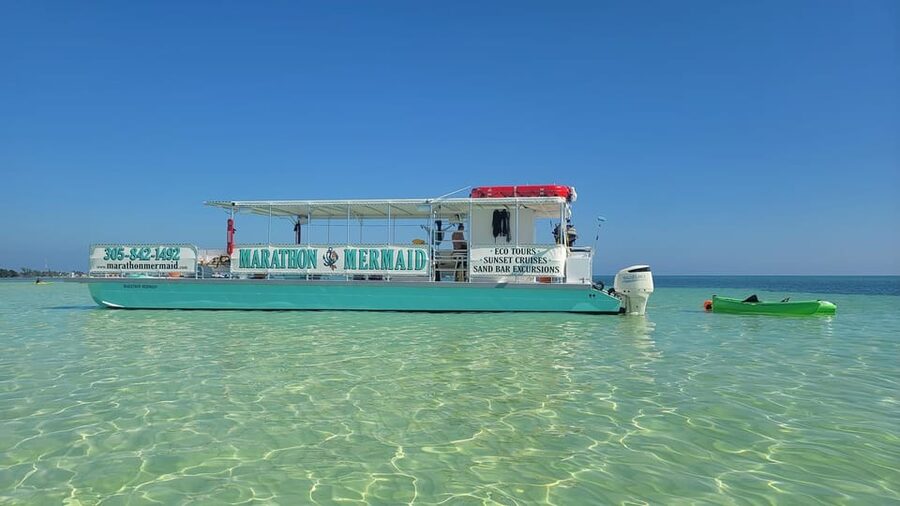 Sandbar Excursion - Vacation Like the Locals Do! - Arriving at the sandbar for four hours of easy island time