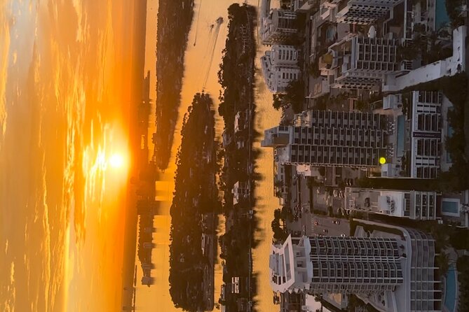 Sunset Helicopter Tour-Miami Iconic Coast and City Views - Haulover sandbar and the crossing toward Port Miami