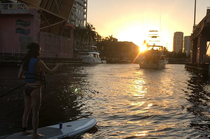 Sunset on Paddleboard Experience in Las Olas Fort Lauderdale - The Wharf and the first city lights