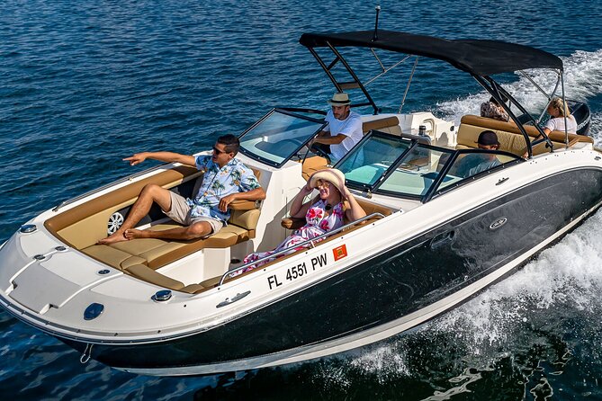 Top-Rated Boat Rental with Captain | 1 to 11 People - Cruising Past Star Island and Hibiscus Island